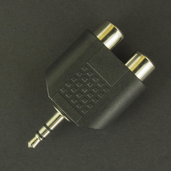 Plug Adaptador RCA a RCA Plástico, Negro, Plateado